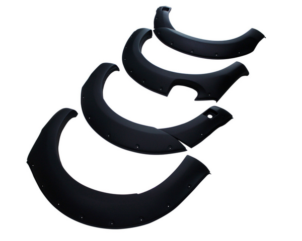 Four black, matte-finish fender flares are arranged in a staggered formation. Each piece is curved with rivet details and is set against a plain white background.