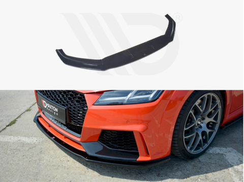 A black front splitter is shown separately and attached to a red sports car's lower bumper on a sunny concrete surface. The car has a license plate reading "DYNATON DESIGN."