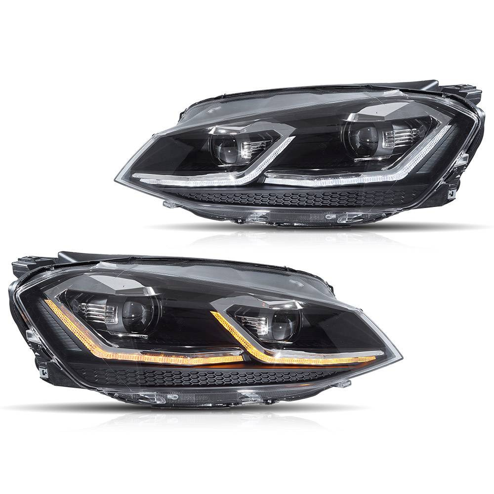 Two sleek car headlights are shown with LED accents; one displays white and the other orange lights. They are placed against a plain white background.