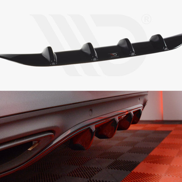 A black rear diffuser with aerodynamic fins is shown in two views: the top isolated, displaying its shape, and the bottom attached to a car on a checkered floor.
