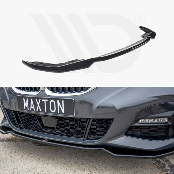 A black car front lip spoiler is shown above its installation on a gray car with a "MAXTON" plate, set on a concrete surface.