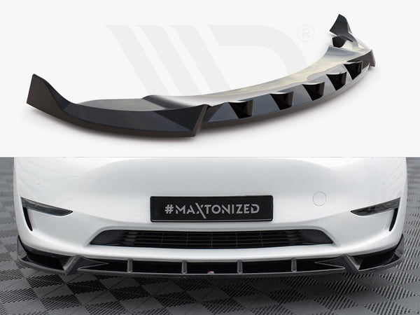 Aerodynamic car bumper extension with a sleek, black finish; installed on a white vehicle's front, which is parked on a checkered surface. License plate reads "#MAXTONIZED."