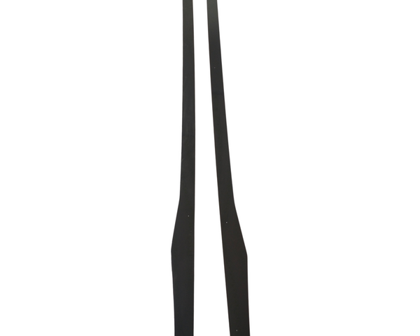 Two black, elongated wooden pieces are standing vertically side by side against a plain white background. They are symmetrical and have tapered ends.