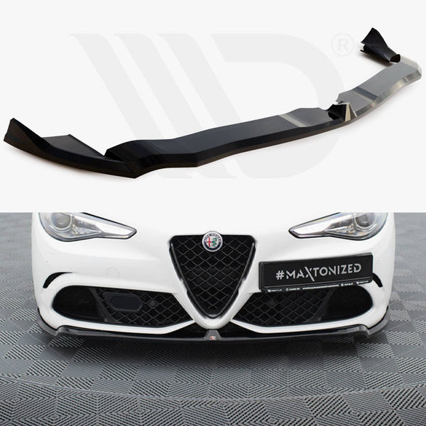 Black car front lip spoiler displayed against a white background, intended for the lower bumper of a white car with the text "#MAXTONIZED" on the license plate, surrounded by checkered flooring.