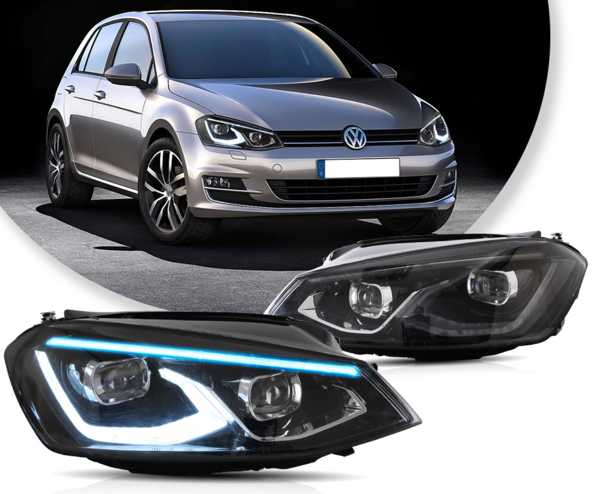 A silver hatchback car is parked on a dark surface, showcasing its two modern, illuminated headlights with blue accents, positioned prominently in front of the vehicle.