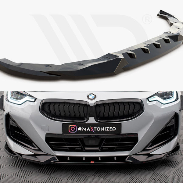 A black car splitter is displayed; the action is showcasing its design. Below, it's installed on a grey BMW, enhancing the front in a showroom with patterned flooring. Text: "#MAXTONIZED."