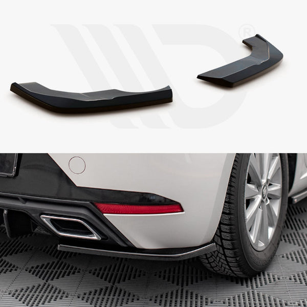 Two glossy, black plastic components are displayed. They are installation-ready extensions. Below, one is fitted to a white car's rear fender, sitting on a checkered floor mat.