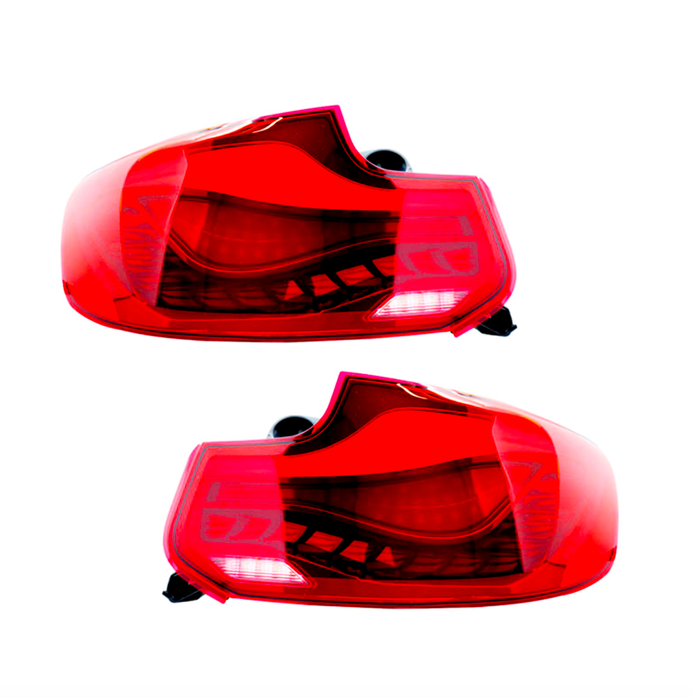 Two red car taillights, unlit, are displayed against a plain white background. Each taillight features intricate internal details and black mounting connectors.