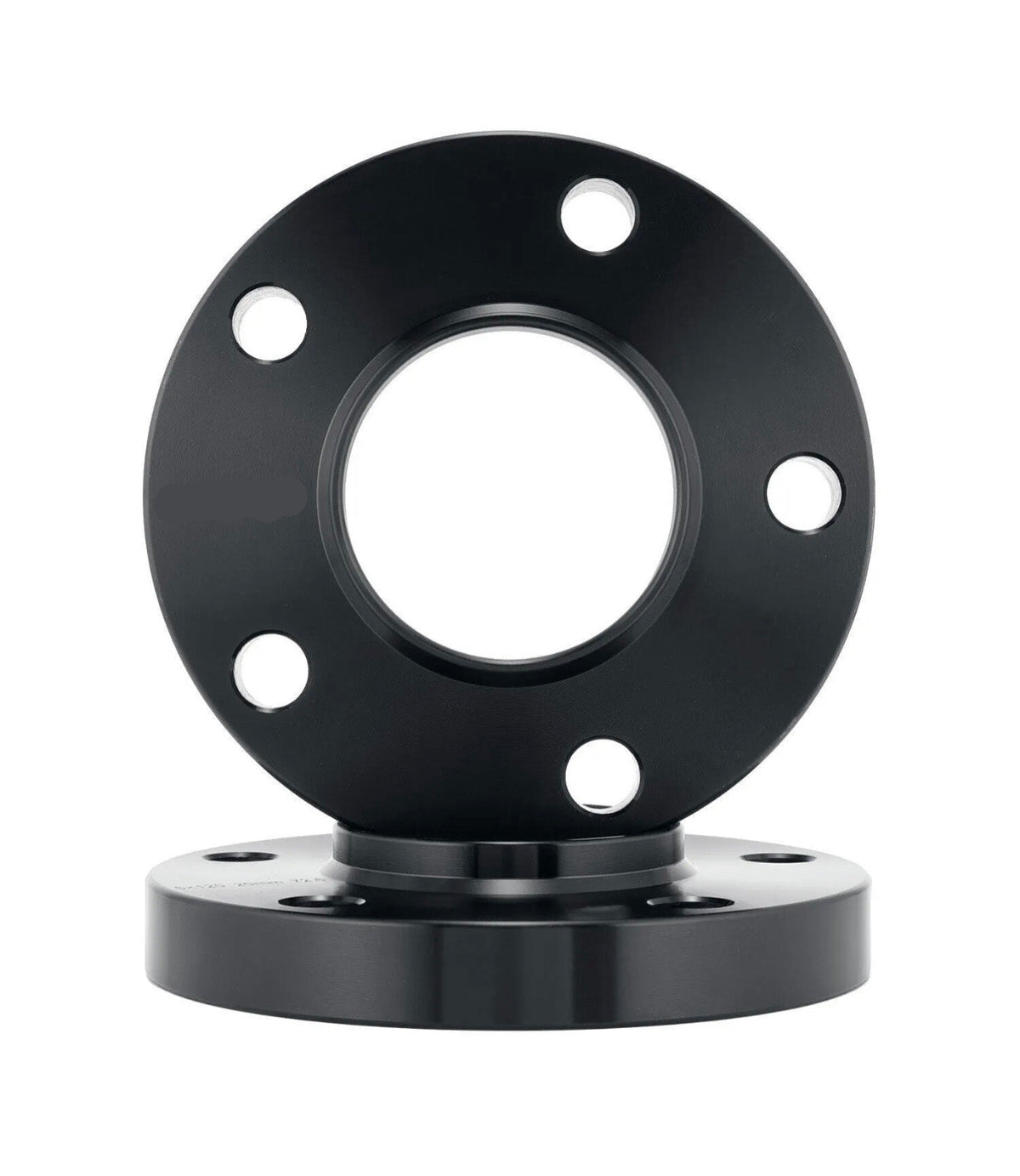 A black circular metal flange with five bolt holes is vertically positioned, placed on another similar flange beneath it against a plain white background.