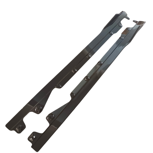 Two long, metallic bars with multiple bolt holes, oriented diagonally. The bars have a reflective surface and are set against a plain, white background.