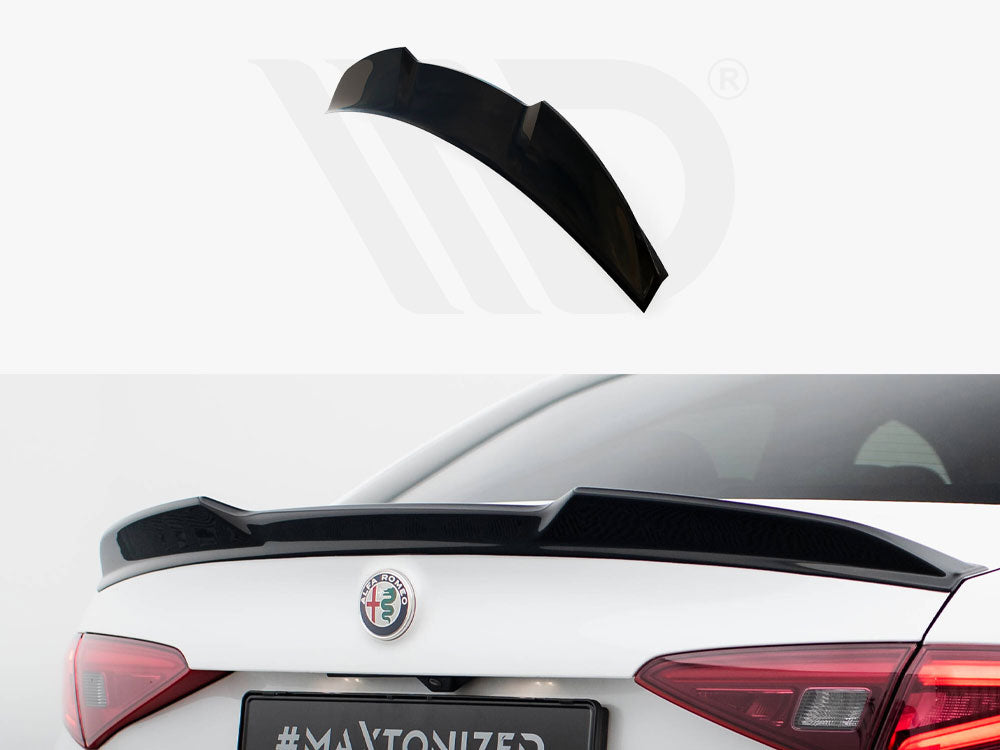 A sleek black car spoiler installed on a white car's trunk, adding aerodynamic style. "MAETONIZED" is visible on the car's license area.