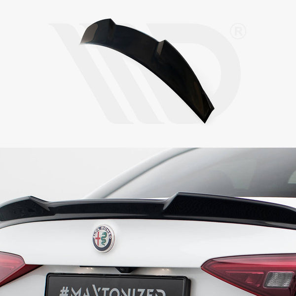 A sleek black car spoiler installed on a white car's trunk, adding aerodynamic style. "MAETONIZED" is visible on the car's license area.