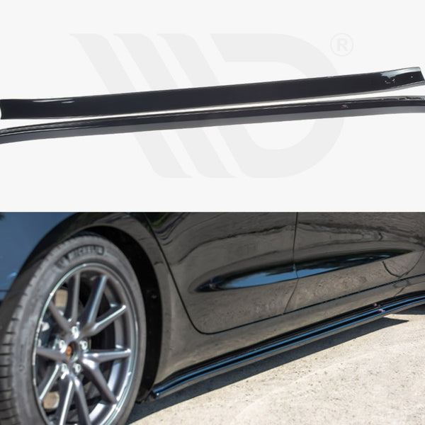 Two black side skirts are shown in the upper image. In the lower image, one is attached to the side of a parked black car with alloy wheels on a concrete surface.