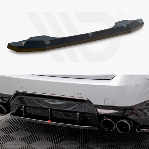 A black car rear diffuser lying flat, designed to fit under the rear bumper of a vehicle. Below, a silver car features the diffuser installed in a garage setting.