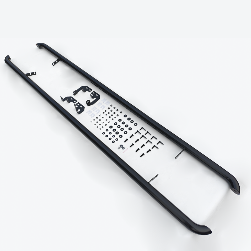 Two black rails rest parallel on a white surface, accompanied by assorted brackets, screws, washers, and hardware components organized between them.