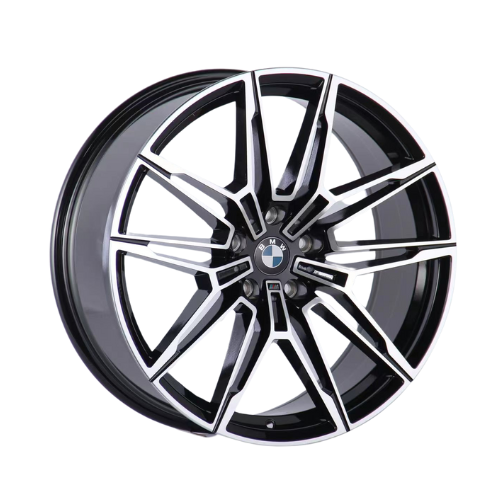 A black and silver alloy wheel features a multi-spoke design with sharp angles and the BMW logo in the center, set against a plain white background.
