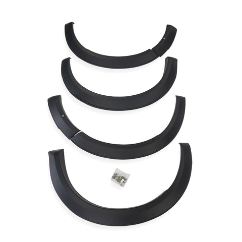 Four black plastic fender flares arranged vertically, each slightly curved, with a small bag of screws below, placed against a plain white background.