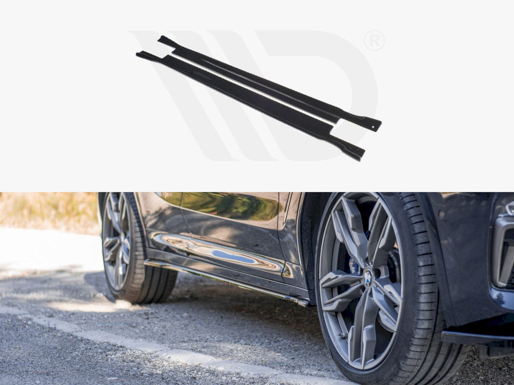 Two black metal strips are positioned horizontally above an image of a car's side, showing wheels and a reflective body, parked on a road with grass nearby.