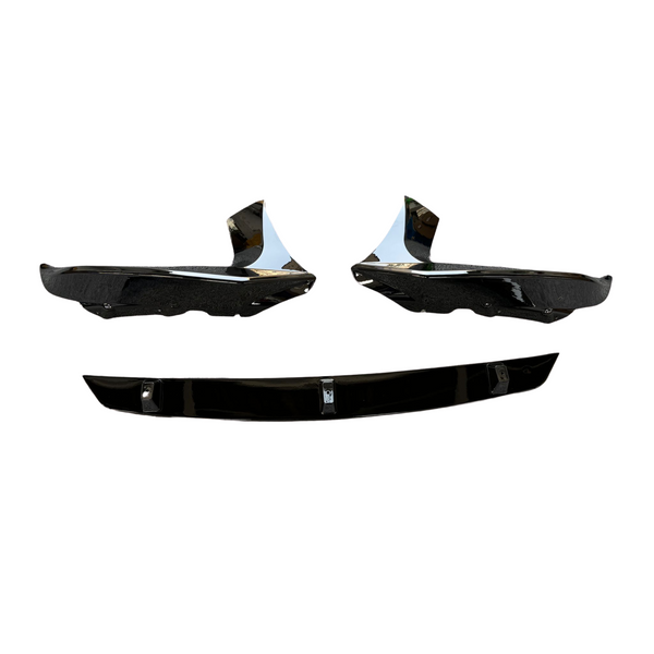 Black car body parts, including two corner sections and one central piece, are displayed against a plain white background.