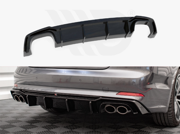 Black car diffuser with vertical fins; shown separately and installed on a grey car's rear, highlighting four exhaust pipes; displayed indoors on a patterned floor.