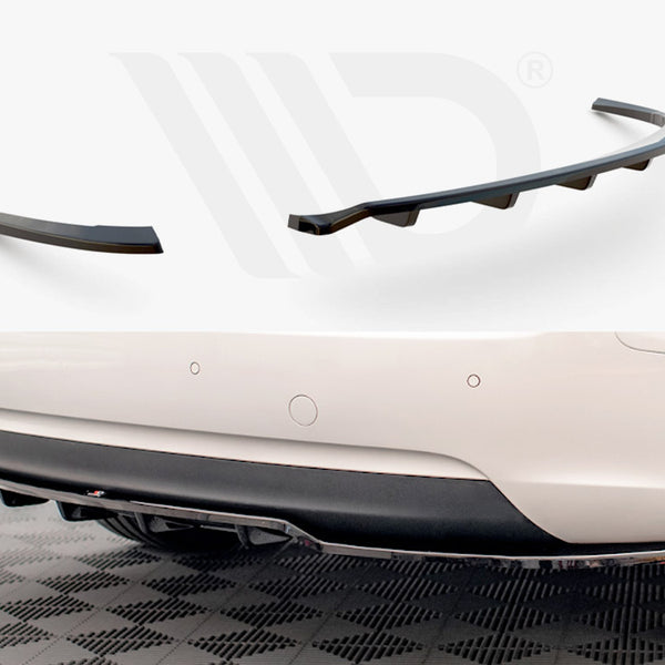 Two black car rear diffusers are displayed; one is curved with fins, while the other is a straight extension. Below, a white car's rear bumper shows a diffuser installed.