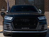 A black Audi SUV, featuring the logo and 