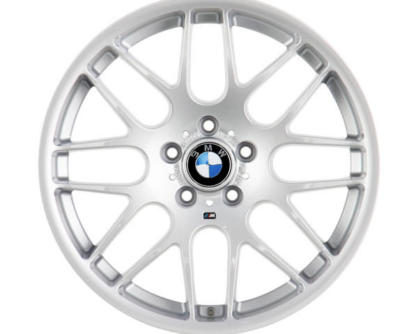 A silver alloy wheel with a BMW logo at the center, displaying multiple spokes, set against a plain white background.