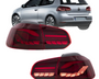 Tail lights are displayed, showing a sleek red design, set against a background image of a silver hatchback car with visible brand and model logos.