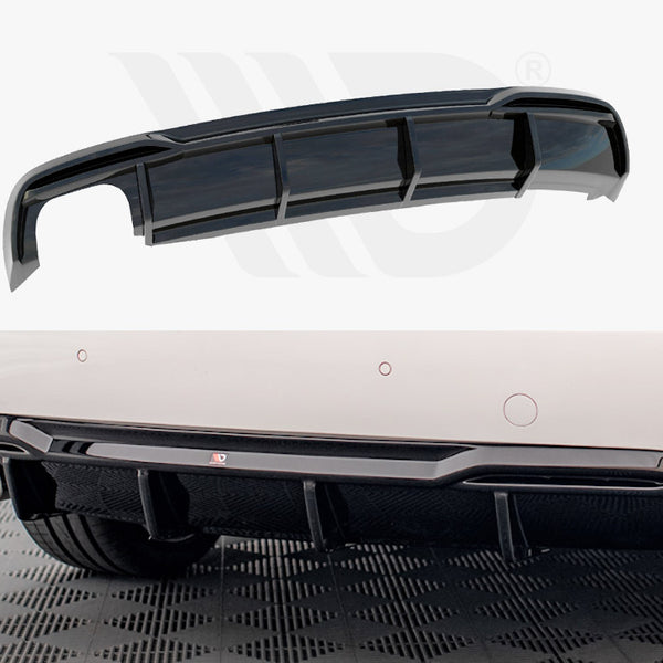 Glossy black rear diffuser; static; attached to white car's bumper with quad exhaust pipes, detailed floor pattern beneath.