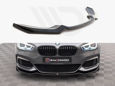 A black front spoiler sits on a white background. Below, a grey BMW with bright headlights displays the spoiler attached. Text on license plate: "#MAXTONIZED CLAROMOTORS." The car is on a geometric-patterned floor.