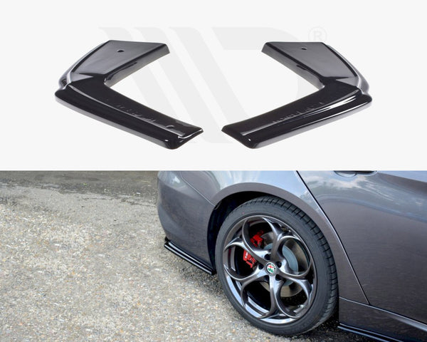 Two black car bumper corner protectors are shown. Below, a gray car with stylish rims and a red brake caliper is parked on a gravel path, featuring one protector installed.