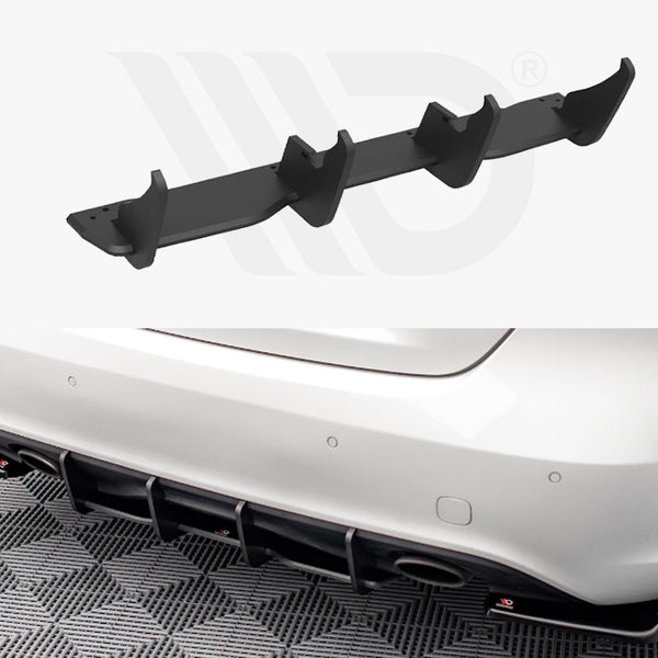 A black car diffuser, consisting of multiple fins, appears in two views: a close-up of the diffuser and its installation on the rear bumper of a white car on a checkered floor.