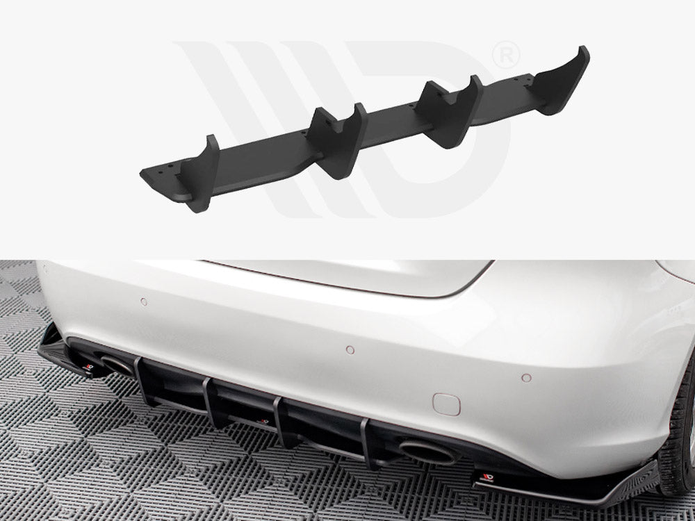 A black car diffuser, consisting of multiple fins, appears in two views: a close-up of the diffuser and its installation on the rear bumper of a white car on a checkered floor.