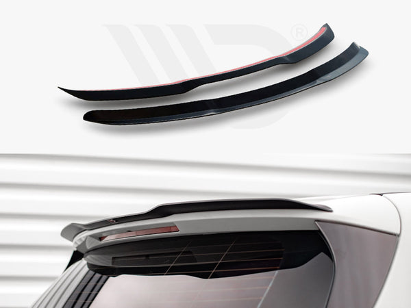 Two black car spoilers, accented with red, rest on a white surface. Below, a spoiler is mounted on a white car's rear against a metallic, ridged background.