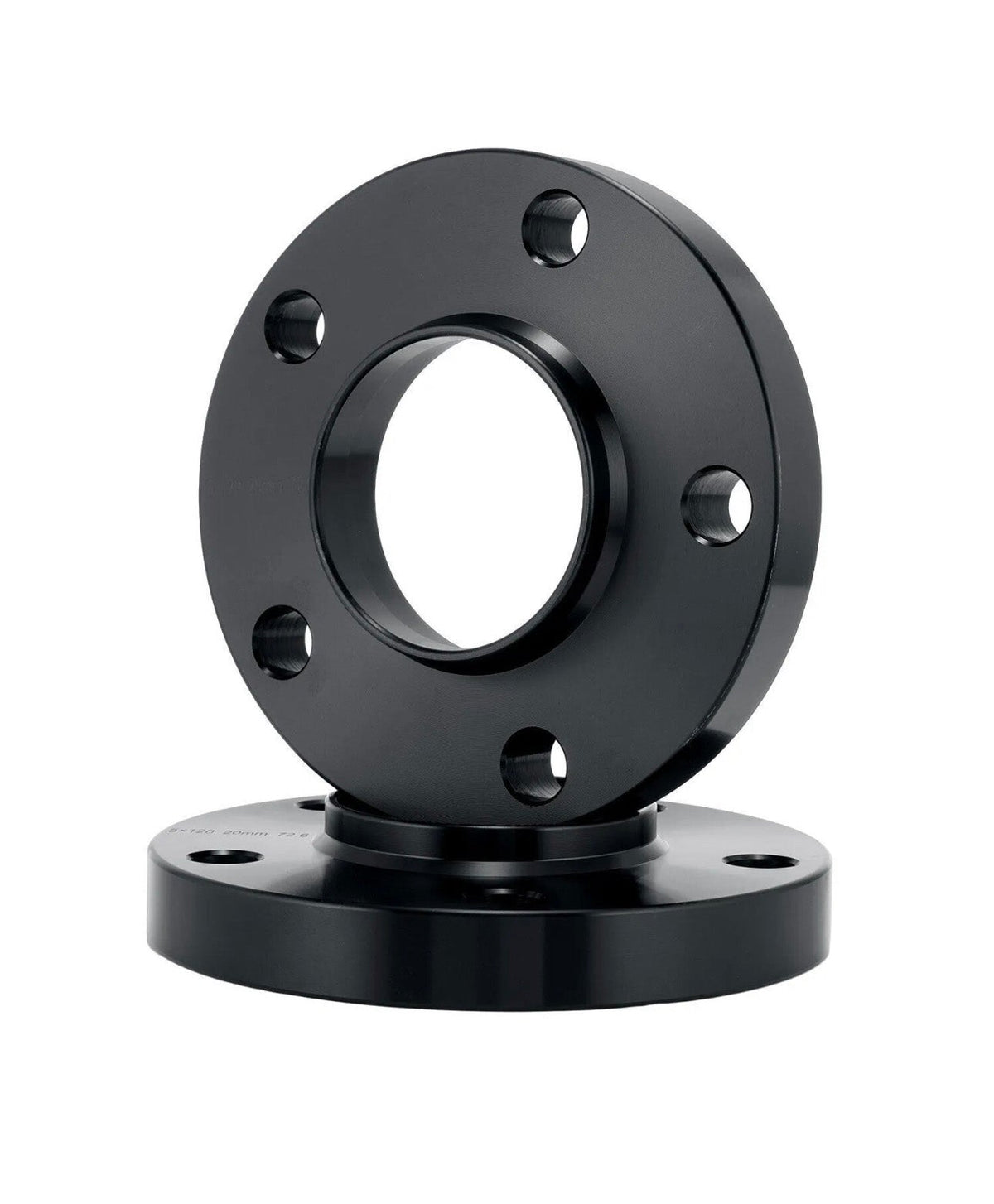 A black metal flange with bolt holes is stacked on another similar flange, positioned upright against a plain white background.