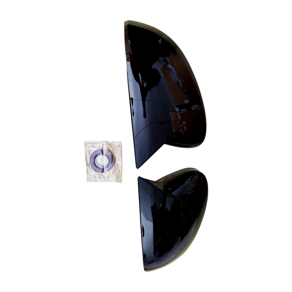 Two glossy black car mirror covers are shown facing each other on a white background, with a small, clear plastic package containing an adhesive tape situated nearby.