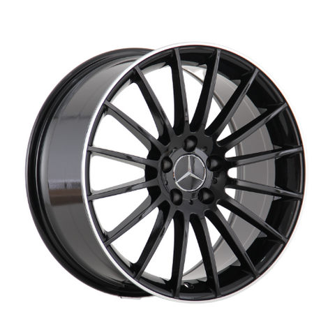 A black alloy wheel with a Mercedes logo, featuring multiple spokes, is shown against a plain white background.
