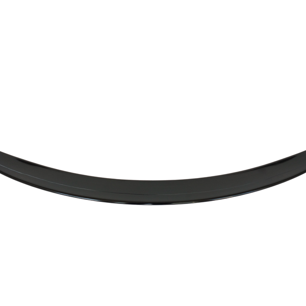 A black, crescent-shaped object curves upward, possibly a car spoiler, set against a plain white background.
