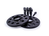 Two black, circular wheel spacers with multiple holes are accompanied by several bolts. The spacers feature the text 