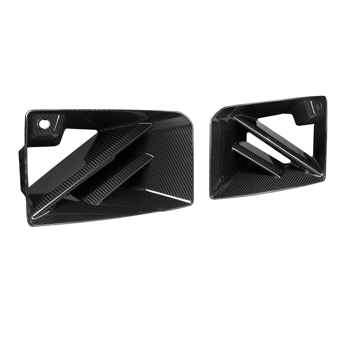 Two black carbon fiber car vents, featuring angular fins, rest on a plain white background, highlighting their sleek design and glossy surface.