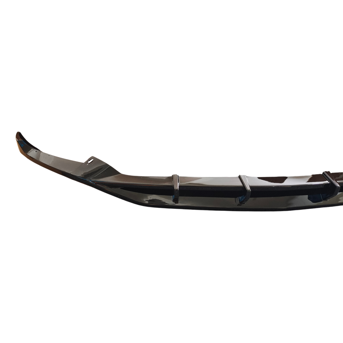 A glossy black car bumper with aerodynamic fins, curving slightly upward at the ends, isolated on a white background.