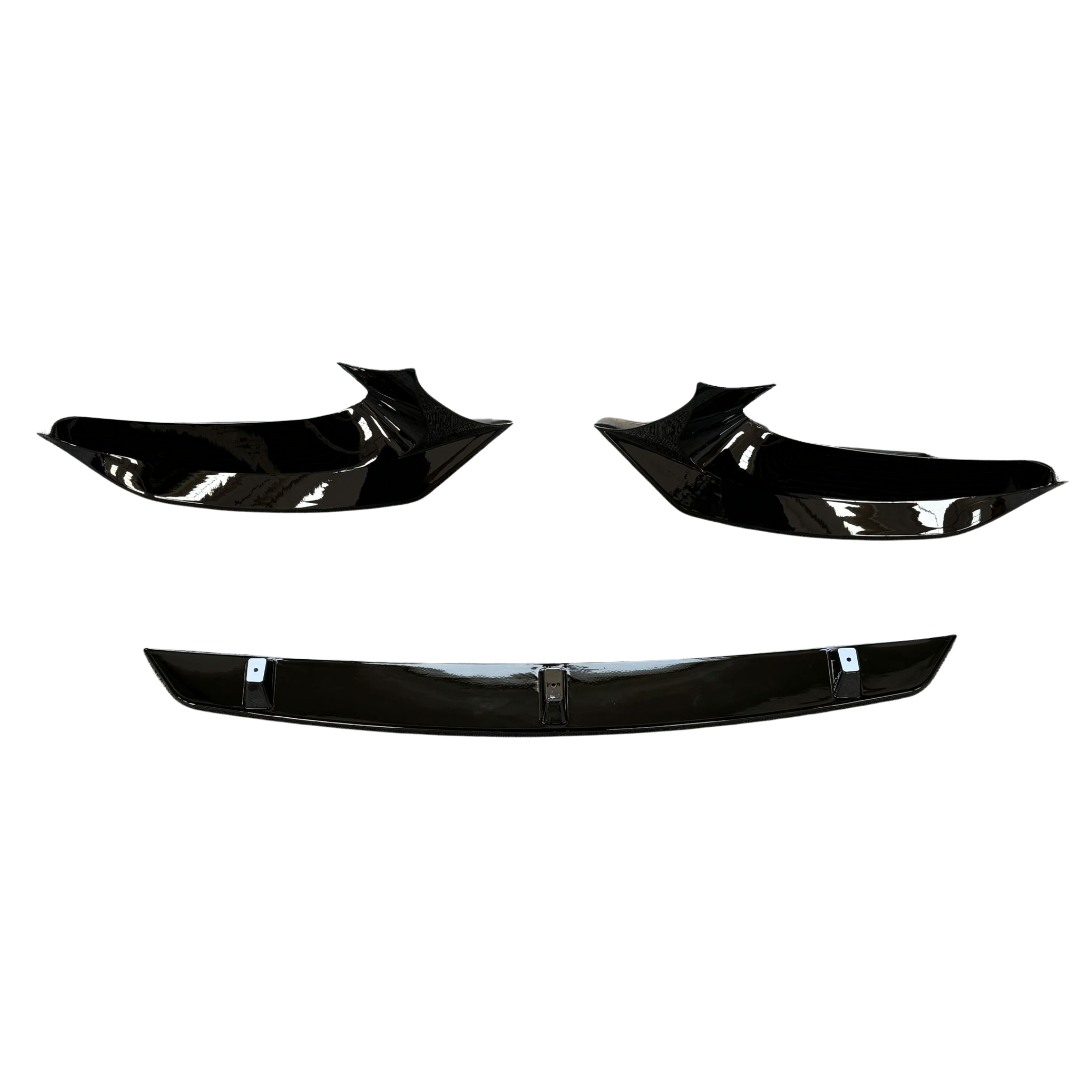 Three glossy black car body parts are displayed against a white background, featuring two angular side components and a straight centerpiece below, resembling a front splitter set.