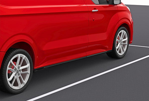 A red van is parked on a dark asphalt surface, with white parking lines visible. The focus is on the side, highlighting its sleek design and silver alloy wheels.