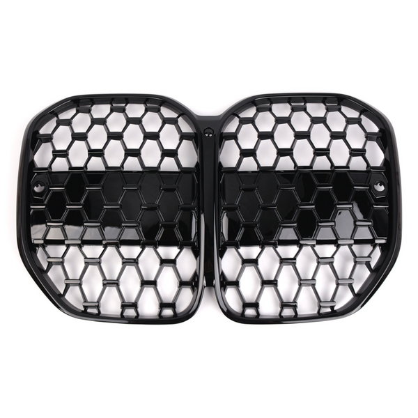 A black, honeycomb-patterned, dual-section car grille with a glossy finish lies against a plain white background, designed for automotive front-end ventilation and style enhancement.
