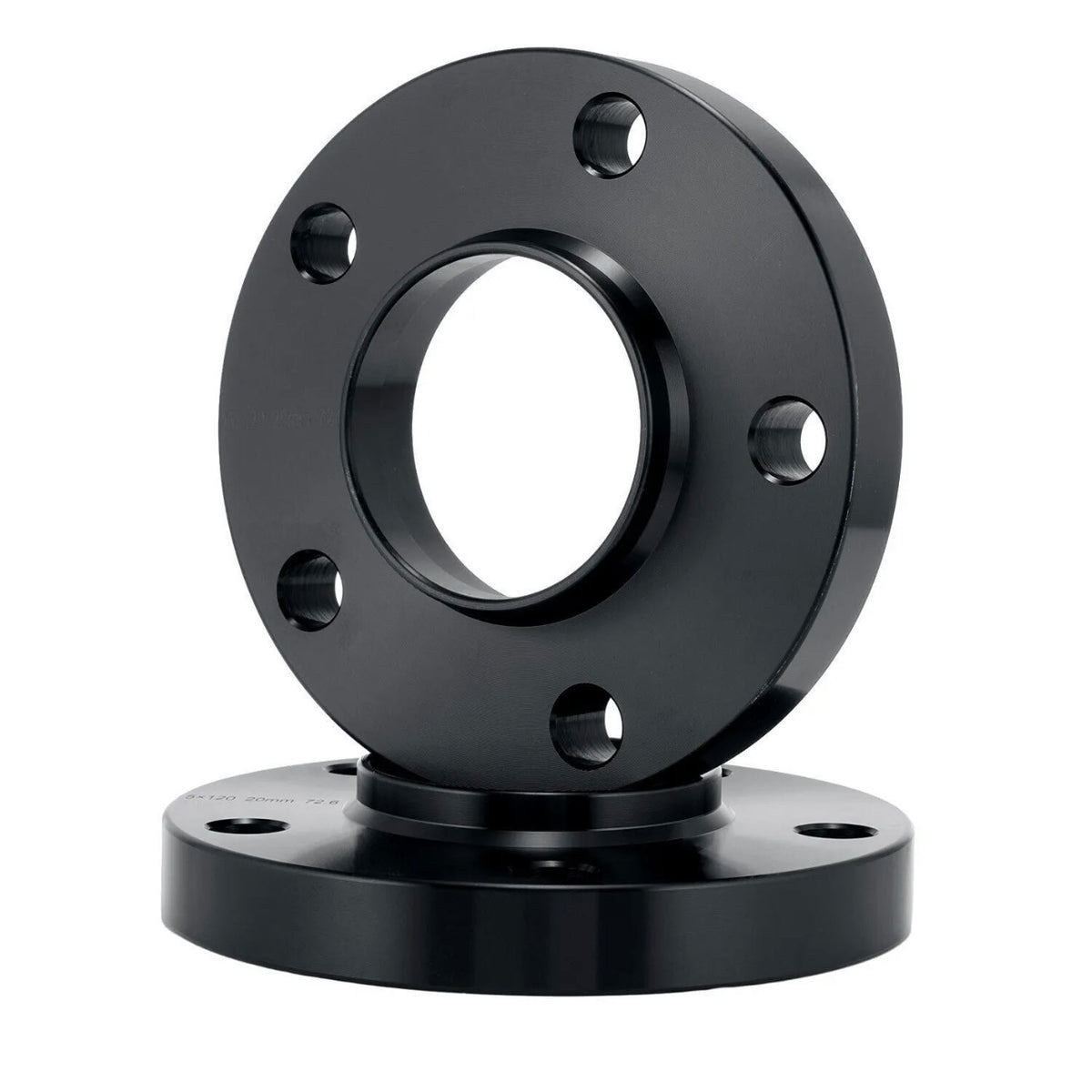 A black metal flange with several bolt holes is positioned upright against a second flange lying flat. The smooth, reflective surfaces are highlighted in a plain white setting.