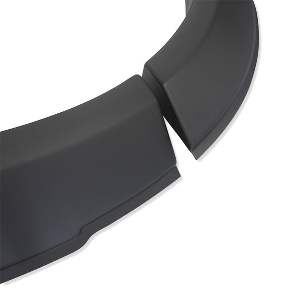 Curved black plastic pieces are arranged on a white background, showing a perspective of overlapping separated components.
