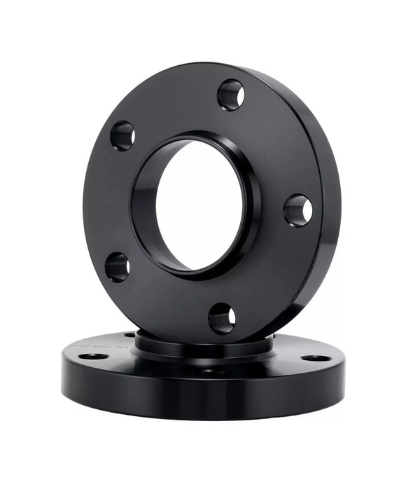 A black metal flange with circular openings sits upright on another identical flange, typically used in pipe systems, placed on a plain white background.