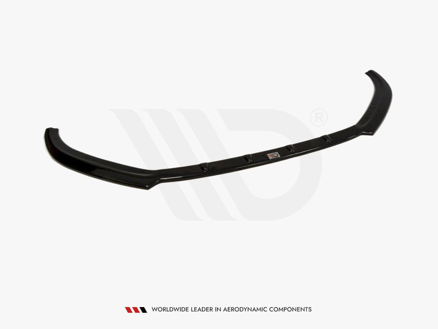 A black car spoiler is displayed on a plain white background, featuring a logo in the center. Text below reads, "WORLDWIDE LEADER IN AERODYNAMIC COMPONENTS."