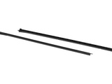 Two long, black plastic rails are placed parallel to each other on a white background, each with a series of evenly spaced grooves.