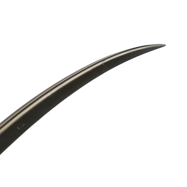 A curved, sleek black blade with a smooth, sharp edge is isolated against a plain white background.